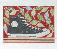 High top sneaker and leaves